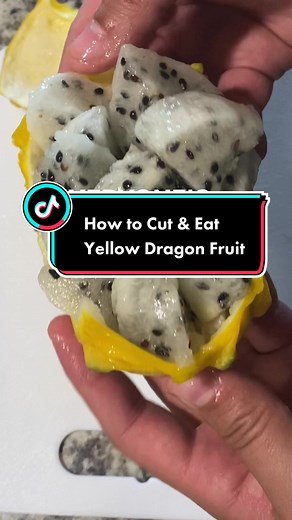 Have you ever tried yellow dragon fruit? 🐉🍍 It may look intimidating, but with a little know-how, cutting and eating it is a breeze! 🌬️ Watch this video to learn how to easily cut and enjoy this delicious fruit. 😋 #YellowDragonFruit #ExoticFruit #HealthyEating #FruitLove #FoodTutorial #HowToCutFruit #EatHealthy #FruitVideo #foodiegram