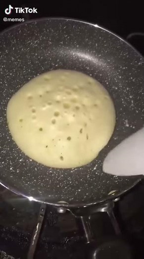 Person flips pancake on burned side and screams