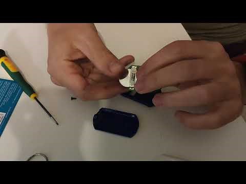 Remplacer la pile d'un badge garage portis