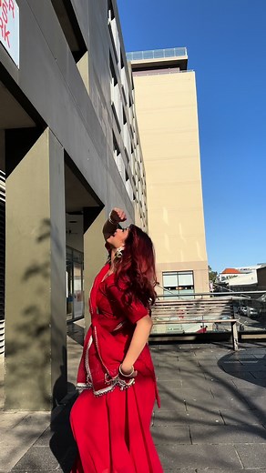Traditional Dance Performance in Vibrant Red Attire
