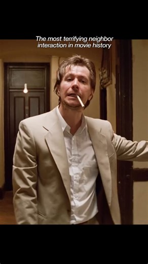 CineSospeso on Instagram: "The hallway transforms into a war zone instantly. When the elderly neighbor opens her door out of curiosity, the corrupt agent meets her with a gun to the face. He delivers the command "He said go back inside" with pure aggression. It establishes the ruthlessness of Stansfield's crew immediately. They operate above the law and silence every witness. The perfect visualization of urban fear. . . #LeonTheProfessional #GaryOldman #LucBesson #JeanReno #90sAction"