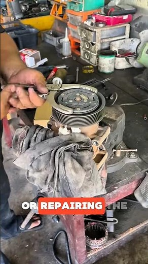 The process of removing or repairing the magnetic clutch on a car's AC compressor #engineering