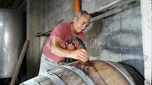 Italian traditional Homemade wine production- filter the wine