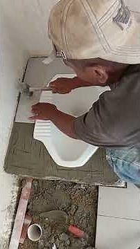 How to install tiles around squat toilet
