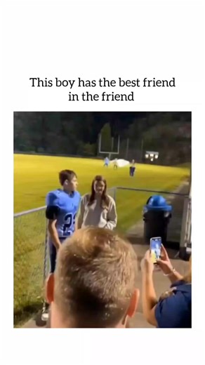 Pubewitty on Instagram: "The Instagram reel showcases a 17-second video of a teenage football player in a blue uniform tenderly hugging and posing for selfies with a girl by a field fence, capturing a joyful post-game moment that resonates as wholesome romance disguised as friendship. , a positivity-focused account with 2.3k likes and 156k views in under two months, the clip aligns with its bio's goal of combating anxiety through feel-good content, drawing comparisons to viral "best friend" trop