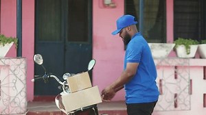 clip-1101631891-african-delivery-courier-man-local-postal-shipping