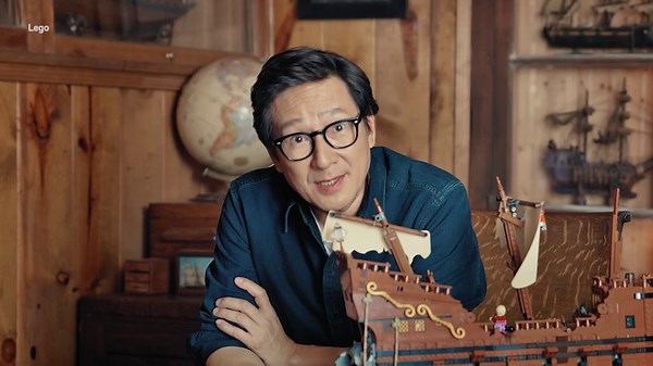 Ke Huy Quan plays with new Lego Goonies set