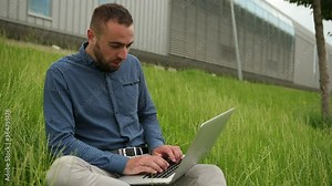 Man look at pc screen live streaming of teacher or coach. caucasian businessman working on his laptop outdoor. Young person with computer