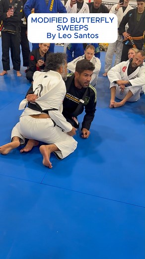 MODIFIED BUTTERFLY SWEEP Here’s a clean blueprint for this modified butterfly (elevator) sweep in BJJ. Core mechanics (from seated butterfly guard) Hooks & grips: Sit tall with both insteps inside their thighs. Get a same-side underhook (hug their lat) and a head post (other hand cups/collars the back of their head/shoulder). Your head is tight under their chin/on their jawline. Trap the Arm: Use the skirt of the gi to wrap around the far arm, and grip the skirt with the near arm. Angle & load: 