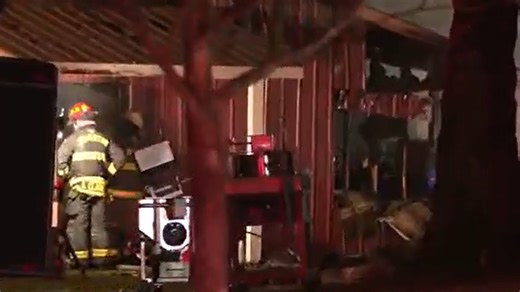 Crews fight large barn fire with tankers