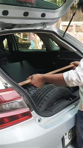 Rajput Sawaisinh bhavarsinh on Instagram: "I am demonstrating the installation of a custom wooden Stepney cover tray 🛠️, specifically designed for CNG-equipped vehicles. This modification ensures secure storage and enhances the utility of your car's trunk space 🚗. Observe the precise fitment. 🚙 #reels #instagram #surat"