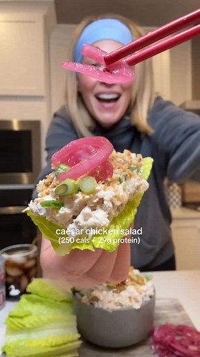 Caesar Chicken Salad (250 cals 29g protein) this recipe makes (7) 3/4c servings: -1.5lbs chopped rotisserie chicken -3/4 0% Greek yogurt -1/2c chopped green onions -1/3c Bolthouse Farms Caesar yogurt dressing -30 crushed croutons -1 tbsp Dijon mustard -1 tbsp Worcester Sauce -1/4c chopped red onion -1 tbsp garlic -season generously with salt and pepper serve on lettuce cups with pickled red onion 💖 #chicken #salad #recipe #protein #girldinner | Samantha Milton