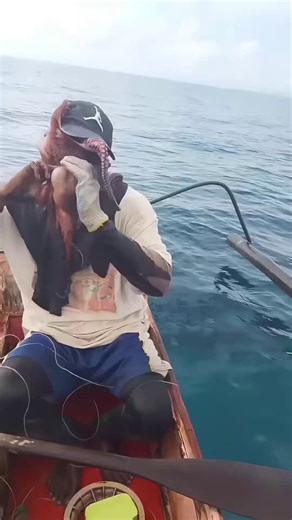 A fisherman ends up getting overpowered by the very fish he caught 😳🎣