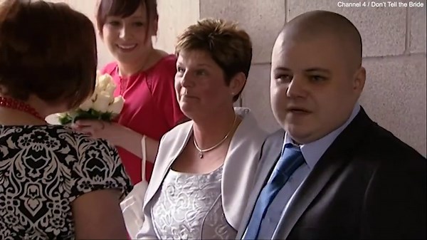 Couple exchange vows infront of 30,000 football fans