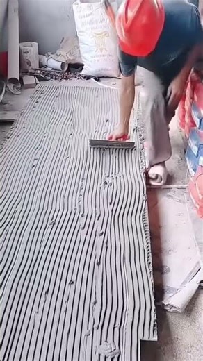 Installing ceramic tiles with cement placed beneath