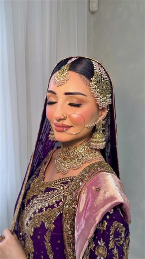 glowy summer bridal glam… but not your typical red desi bride 💜✨ - - Hair: @HairByAlina__xo Outfit:@Aisha Naheed Jewellery: @FJACCESSORIES By Ruqiyah Jamil Muse: @memu #summerbride #pakistani #bridalmakeupartist #glambyghazia #purple