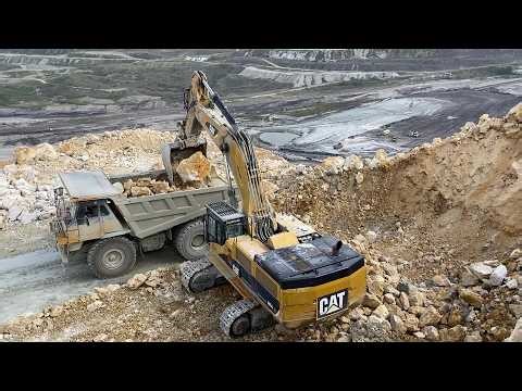 Cat 385C Excavator Loading Cat 775E Dumpers With Blasted Materials - Pyramis Ate