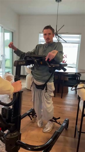 Rifton in Real Life | Setup of the Week: E Pacer This video features the E Pacer, a powered gait training device designed to support clients who require higher levels of assistance with standing and walking. As the largest member of the Pacer family, the E Pacer combines electric lift assist with secure body support to help clients stand safely and participate in gait training when manual transfers are no longer appropriate. In this setup, pelvic support is used along with ankle prompts attached