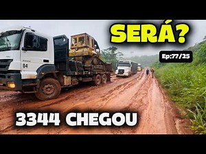 CAMINHÃO CARREGADO COM TRATOR VAI TENTAR PUXAR A CARRETA