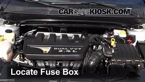 Interior Fuse Box Location: 2012 Chrysler 200 Touring 2.4L 4 Cyl. Sedan (4 Door)