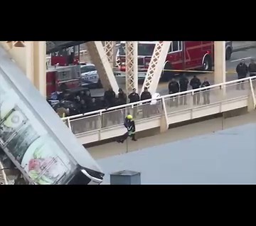 67K views · 711 reactions | Louisville emergency crews rappelled down off the Clark Memorial Bridge on Friday to rescue the driver of semitruck that was dangling over the Ohio River, an operation the city's fire chief called a "once-in-a-career type of thing." | WDRB News | Facebook