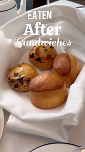 Afternoon tea consists of tea served with three courses, eaten in the order of sandwiches, scones and cakes/petit fours. Scones are traditionally served with clotted cream and strawberry jam. Devonshire (from Devon) or Cornish (from Cornwall) clotted cream is rich and sweet in taste, thick and spreadable like butter. Scones when eaten should first be gently broken apart. This is done to acknowledge the skill of the baker and to determine its freshness. A perfect scone is light and fluffy. An add