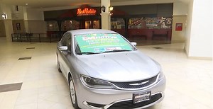 Santa Maria car dealership donating a new car to a family in need