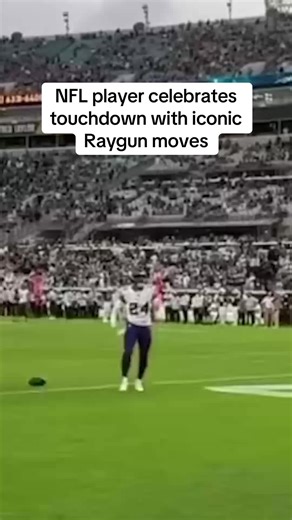 NFL Player Celebrates Touchdown with Iconic Raygun Moves