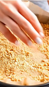 Butterfinger Caramel Crunch Cookies Bars 🍯🍫 Crispy, chewy, and dripping with golden caramel magic. When grandma’s candy jar meets the cookie tray — you get this irresistible caramel crunch. Ingredients 2 cups crushed Butterfinger candy bars 1½ cups all-purpose flour ½ cup powdered sugar 1 cup unsalted butter, melted 1½ cups caramel candies, unwrapped 3 tbsp heavy cream 1 cup white chocolate chips ½ cup crushed Butterfinger for topping How to Make It 1️⃣ Mix the Base Combine crushed Butterfinge