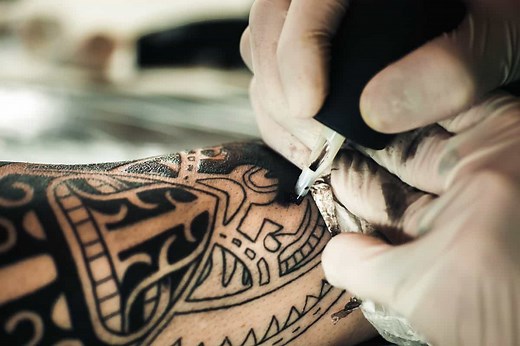 How Deep Does Tattoo Ink Go? Needle Depth, Explained.