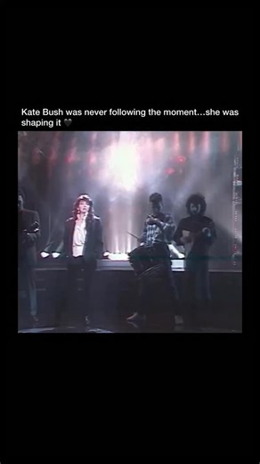 Viral Music Nation on Instagram: "Kate Bush performing “Running Up That Hill” live in 1985 — a moment that captures exactly why her work continues to resonate decades later. Kate Bush is a British singer, songwriter, and producer who built her career entirely on her own terms. She broke through in 1978 with “Wuthering Heights,” a song she wrote at just 18 years old, becoming the first woman to top the UK charts with a self-written song. From the beginning, she stood apart — not just for her voic