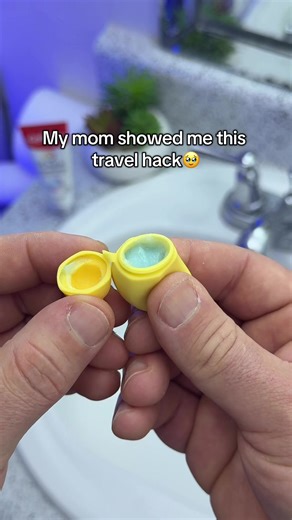 Travel hack for keeping your toothbrush clean. 🧳🪥 #travelhack #travelessentials #travelgadgets #toothbrushhack #traveltips This mini toothpaste container saves space and keeps everything hygienic when traveling. Perfect for flights, hotels, and everyday carry. Would you actually use this for travel? 🤔