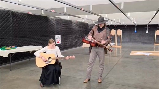 Mike Penner was match director for today's indoor match in Regina. Instead of a storyline we were presented with a song storyline. Mike Penner (Maryfield) accompanied by Lilly (Liver Eatin Lilly). One verse for every stage. A real treat. | Saskatchewan Association of Wild West Shooters
