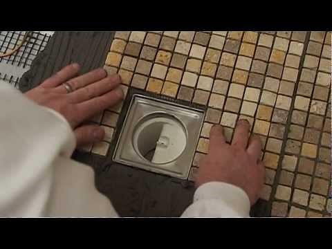 Wet room installation video - Tiling the former and waste