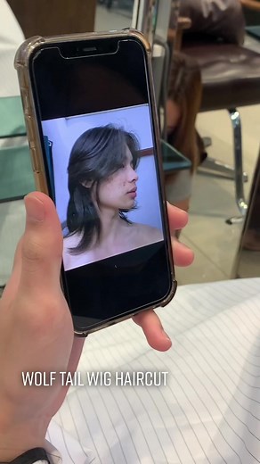 Unique Wolf Tail Haircut: Blend of Mullet and Shag