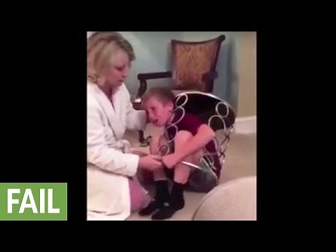 Kid manages to get stuck in a table
