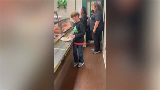 Students use ASL to place lunch orders for deaf cafeteria staff