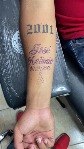 Fresh Gothic Tattoo with Cancer Awareness Symbol