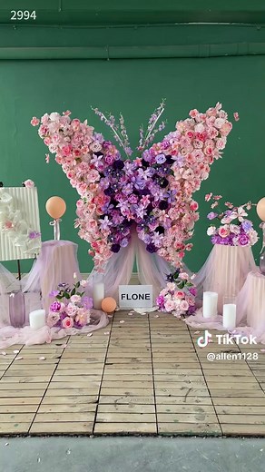 Butterfly-Shaped Pink and Purple Flower Arrangement