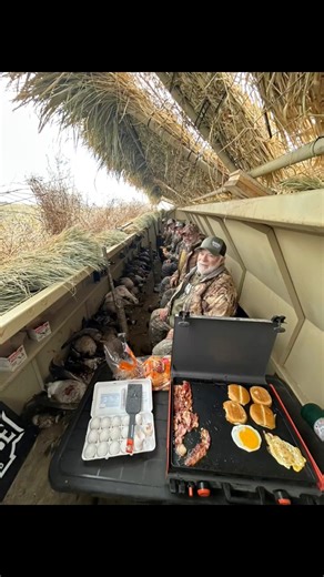 Nothing better than a hot breakfast in the blind! Comfort, Concealment, and cooking the IronHide Blinds way! #ducks #waterfowl #waterfowlhunting #duckhunting #duck #goose #geese #goose hunting #migrationwaterfowl #themigration #ducksunlimited #deltawaterfowl #mallard #greenheads #woodducks | IronHide Blinds