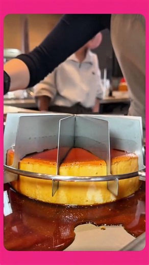 A honey cheesecake sliced into neat triangular pieces, revealing its smooth and creamy layers.