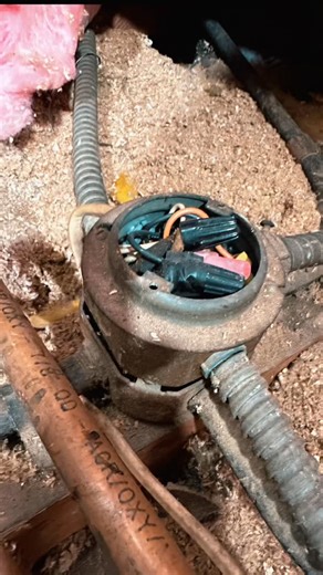 One & Done Electric INC on Instagram: "⚡😬 Found in the attic… and this is exactly why shortcuts don’t belong in electrical work. Open junction box ❌ Loose splices ❌ No cover ❌ Mixed aluminum cloth wire with copper conductors ❌⚠️ That mix is a serious fire risk if it’s not properly terminated with approved connectors and methods. Different metals expand differently — and that’s how overheating starts. 🔥 Do it right. Do it safe. Do it One & Done. 🔧✅ #oneanddoneelectric #ElectricalHazard ⚠️ #Cod
