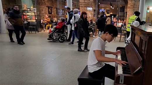 A public piano performance of Faded by Alan Walker