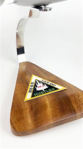 Supersonic style! The 305th BW “Greased Lightning” B-58A Hustler comes alive in this stunning handcrafted mahogany model. The Convair B-58A Hustler was the first operational supersonic bomber, capable of sustained Mach 2 flight, giving the 305th Bomb Wing unmatched speed and penetration capability during the Cold War. The 305th BW operated B-58A serial 55-0665 “Greased Lightning,” one of the most recognized aircraft in the fleet, representing the wing’s role in tactical proficiency competitions 