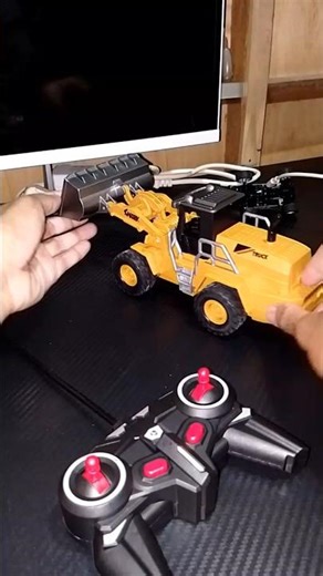 let's turn the remote control bulldozer first