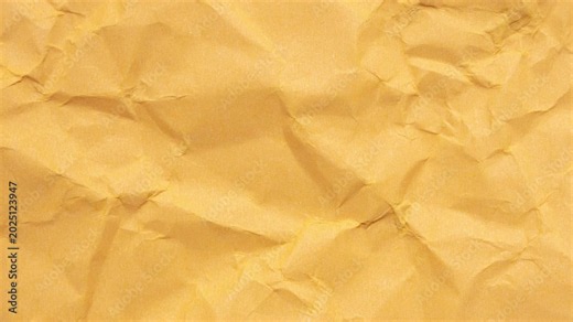 crumpled yellow kraft paper texture background