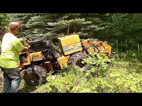 Burying wire with a Wilton Thinline Trenching Spade and a Vermeer LM-42