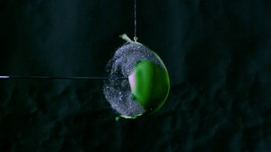 Arrow explodes glitter balloons in slow motion. 🏹🎈 | World Archery