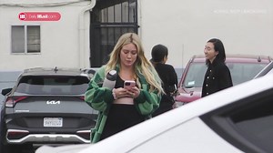 Hilary Duff flashes her baby bump while out running errands in Los Angeles