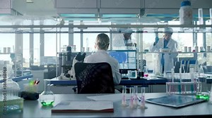 Medical Science Laboratory with Diverse Team of Professional Research Scientists Talking, Working with Microscopes, Computers, Micro Pipettes. Developing Drugs, Gene Editing using High-Tech Equipment